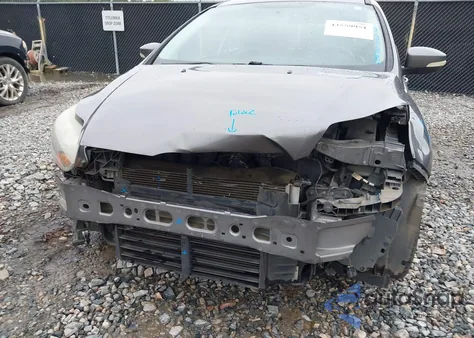 2014 Ford Focus Titanium from USA, damaged, VIN 1FADP3N28EL159451